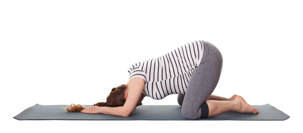 Pregnant Woman Doing Yoga Asana Balasana Child Pose